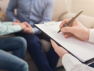 Unrecognizable couple at therapy session